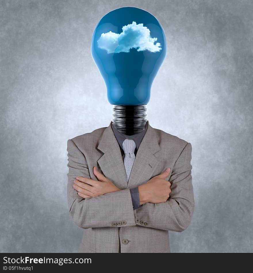 Businessman with lightbulb head with the clouds as concept. Businessman with lightbulb head with the clouds as concept