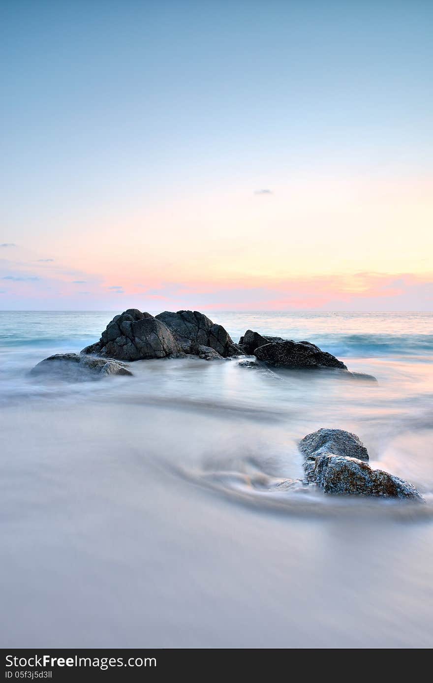 Sea wave on the beach at sunset time. Sea wave on the beach at sunset time