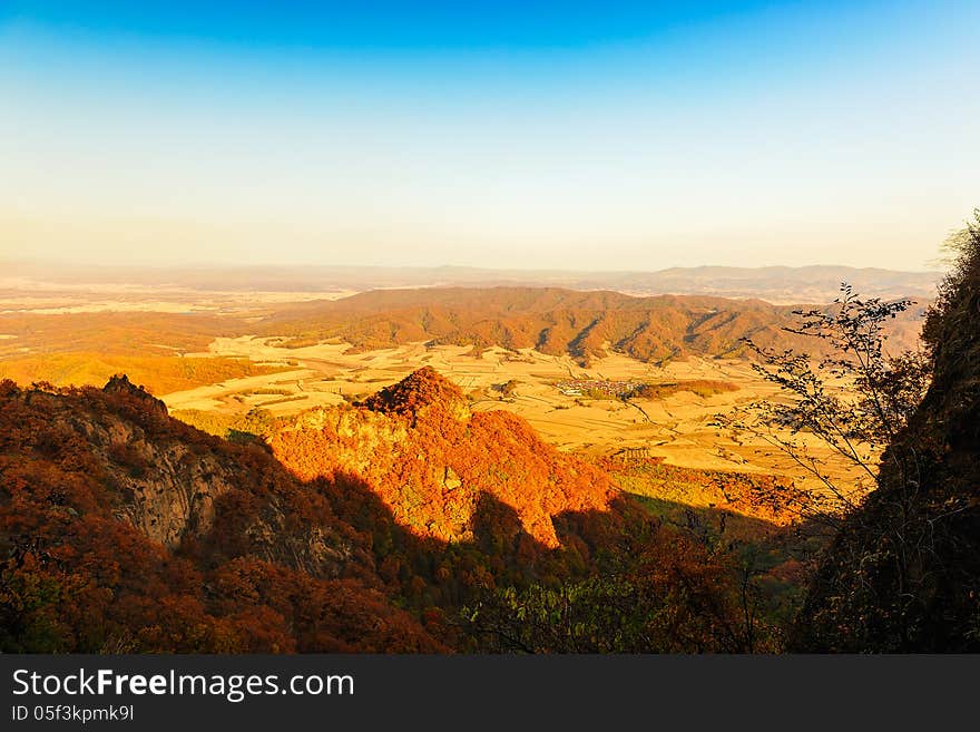 The Distant Mountains In Autumn