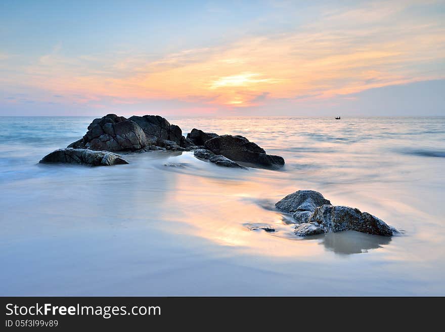 Sea wave on the beach at sunset time. Sea wave on the beach at sunset time