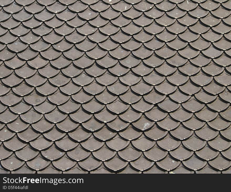 Pattern of ancient black roof in Thai temple