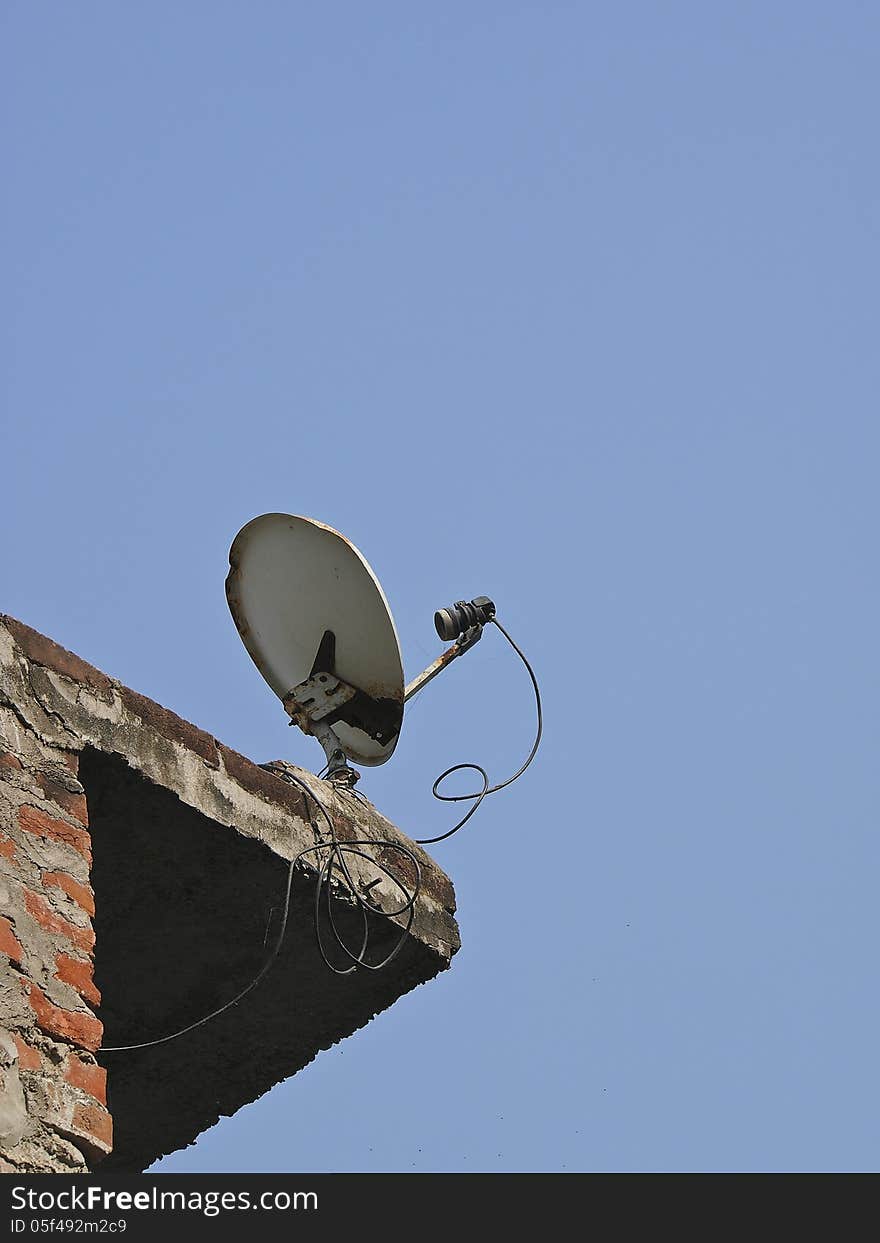 Crush Satellite dish fix on top in sunny day