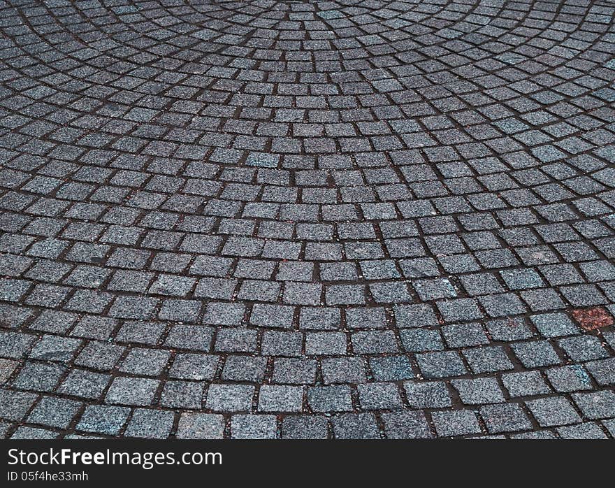 The gray pavement, built of stones in a semicircle in Dresden, Germany. The gray pavement, built of stones in a semicircle in Dresden, Germany