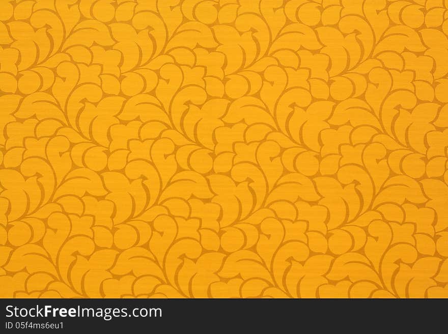 Orange background on wallpaper of thai pattern