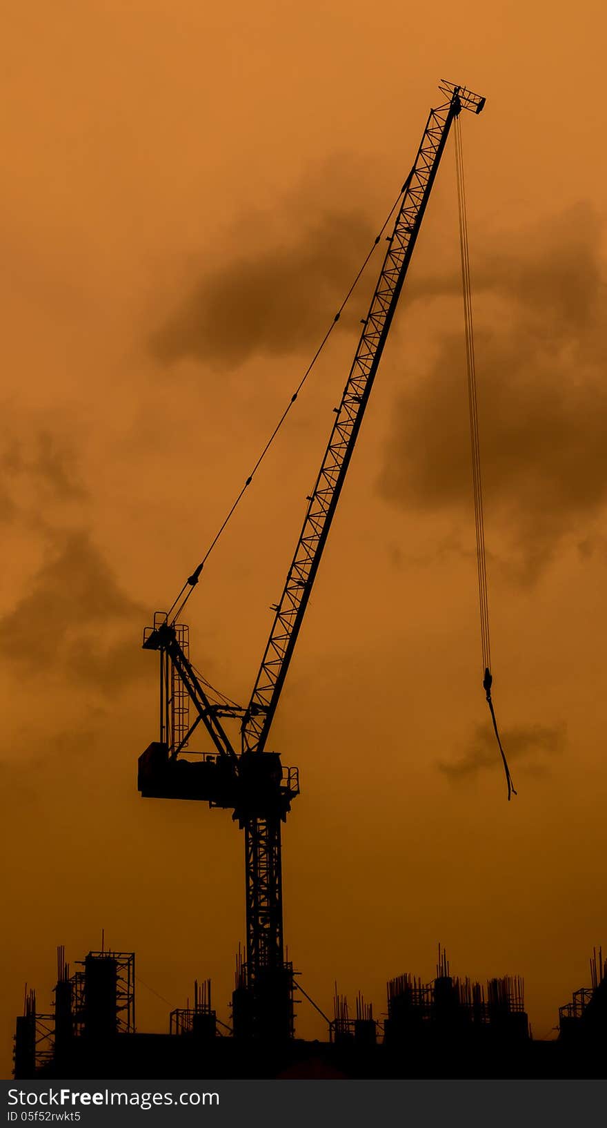 High crane on the top of the construction