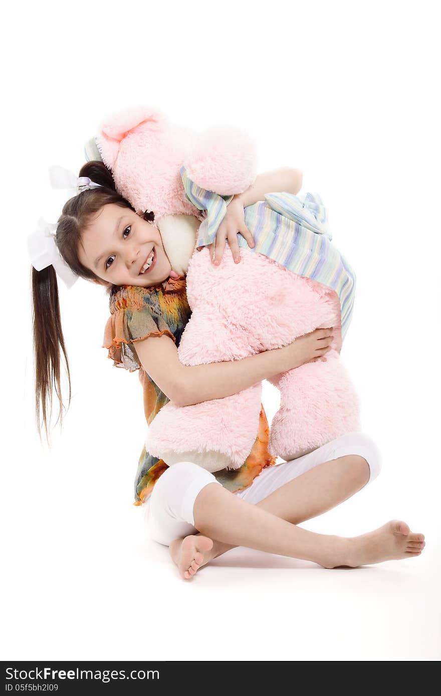 Little Girl And Teddy Bear on white background