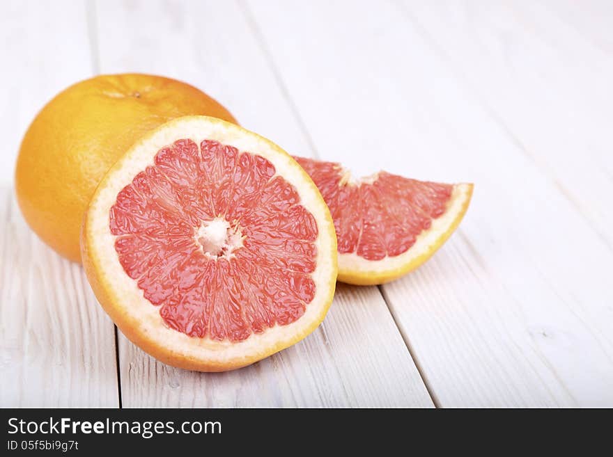 Grapefruit on a  wooden background. selective focus