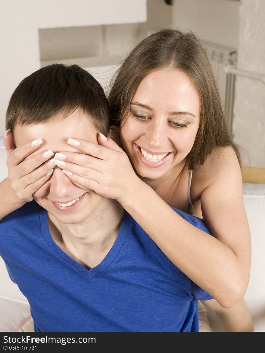 Close up portrait of pretty young couple. man and woman hugging