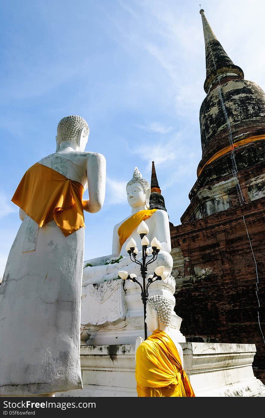 White Buddha Statue And Stupa