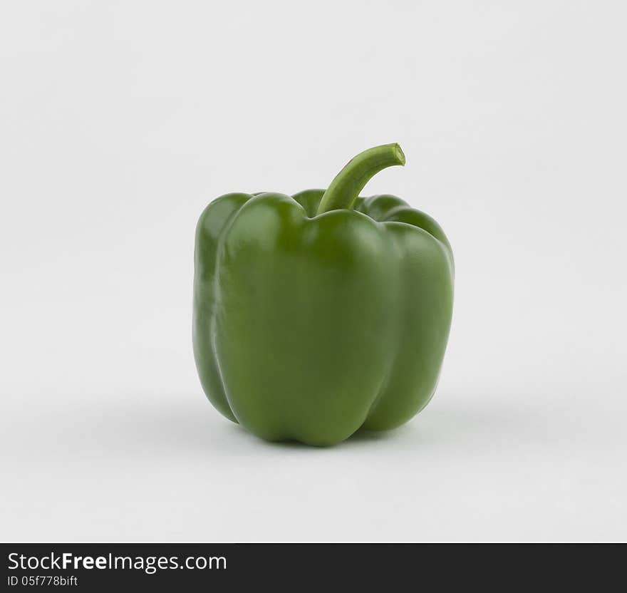 Green sweet pepper great for cooking and salad the image on white. Green sweet pepper great for cooking and salad the image on white