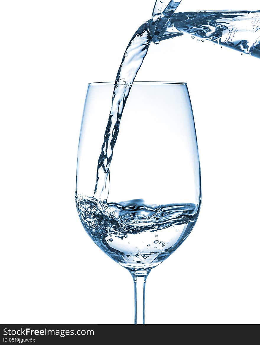 Mineral water being poured into a glass. Mineral water being poured into a glass