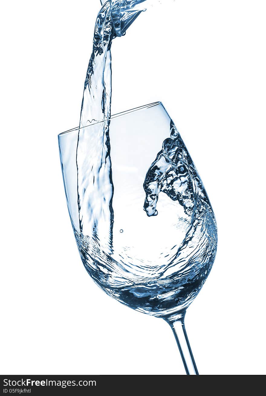 Mineral water being poured into a glass. Mineral water being poured into a glass