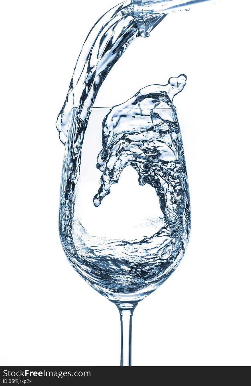 Mineral water being poured into a glass. Mineral water being poured into a glass