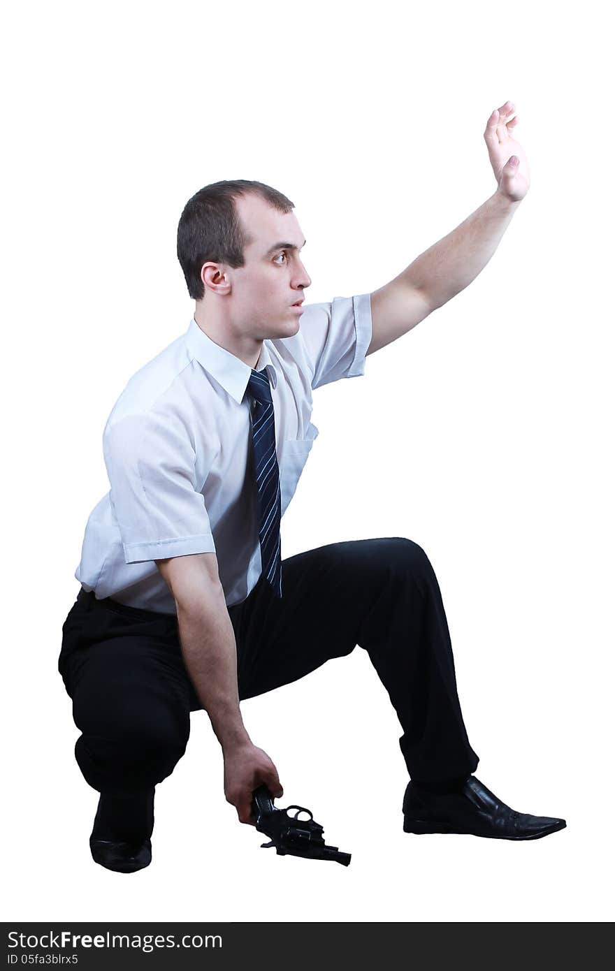 Professional man who keeps a gun pointing it at a target on a white background. Professional man who keeps a gun pointing it at a target on a white background