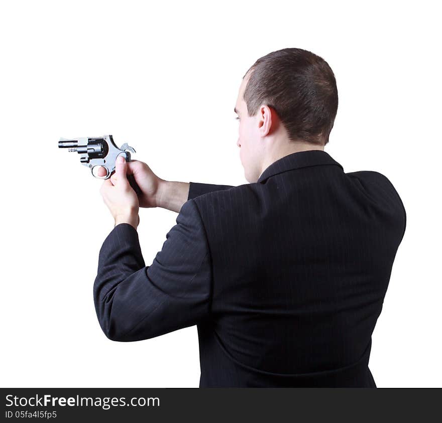 Professional man who keeps a gun pointing it at a target on a white background. Professional man who keeps a gun pointing it at a target on a white background