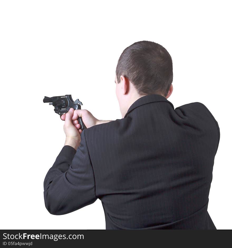 Professional man who keeps a gun pointing it at a target on a white background. Professional man who keeps a gun pointing it at a target on a white background