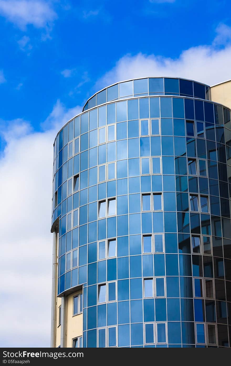 Modern blue glass wall of skyscraper