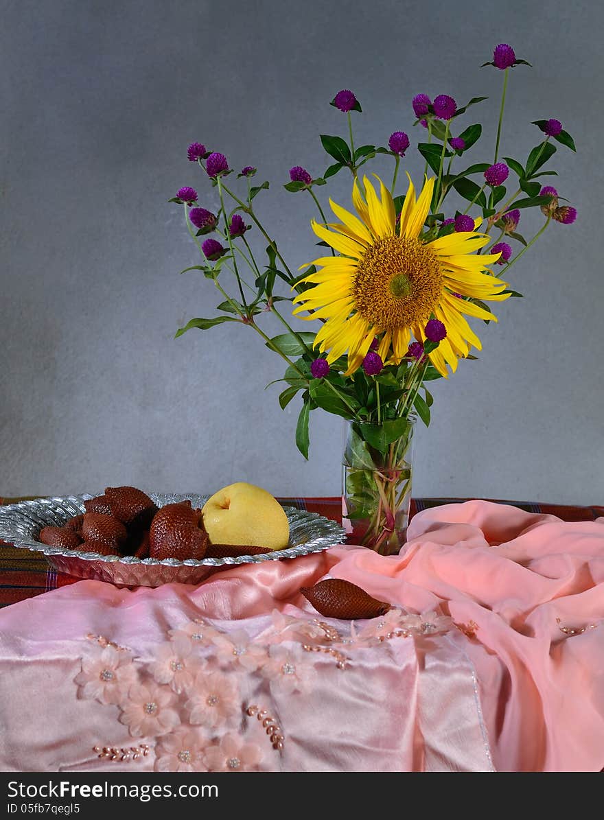 Flowers and fruit in still life concept for decoration design
