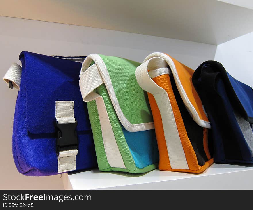 The different color textile handbags for young people. The different color textile handbags for young people