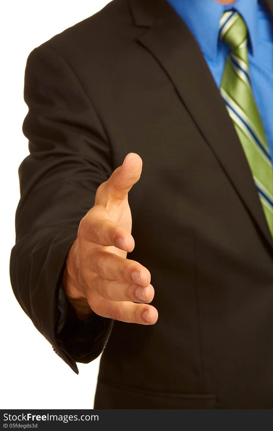 Business man in suit offering a handshake isolated on white background.