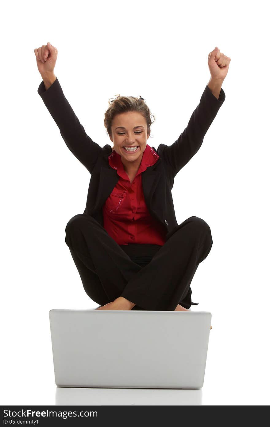 Beautiful caucasion female with laptop excited isolated on white.