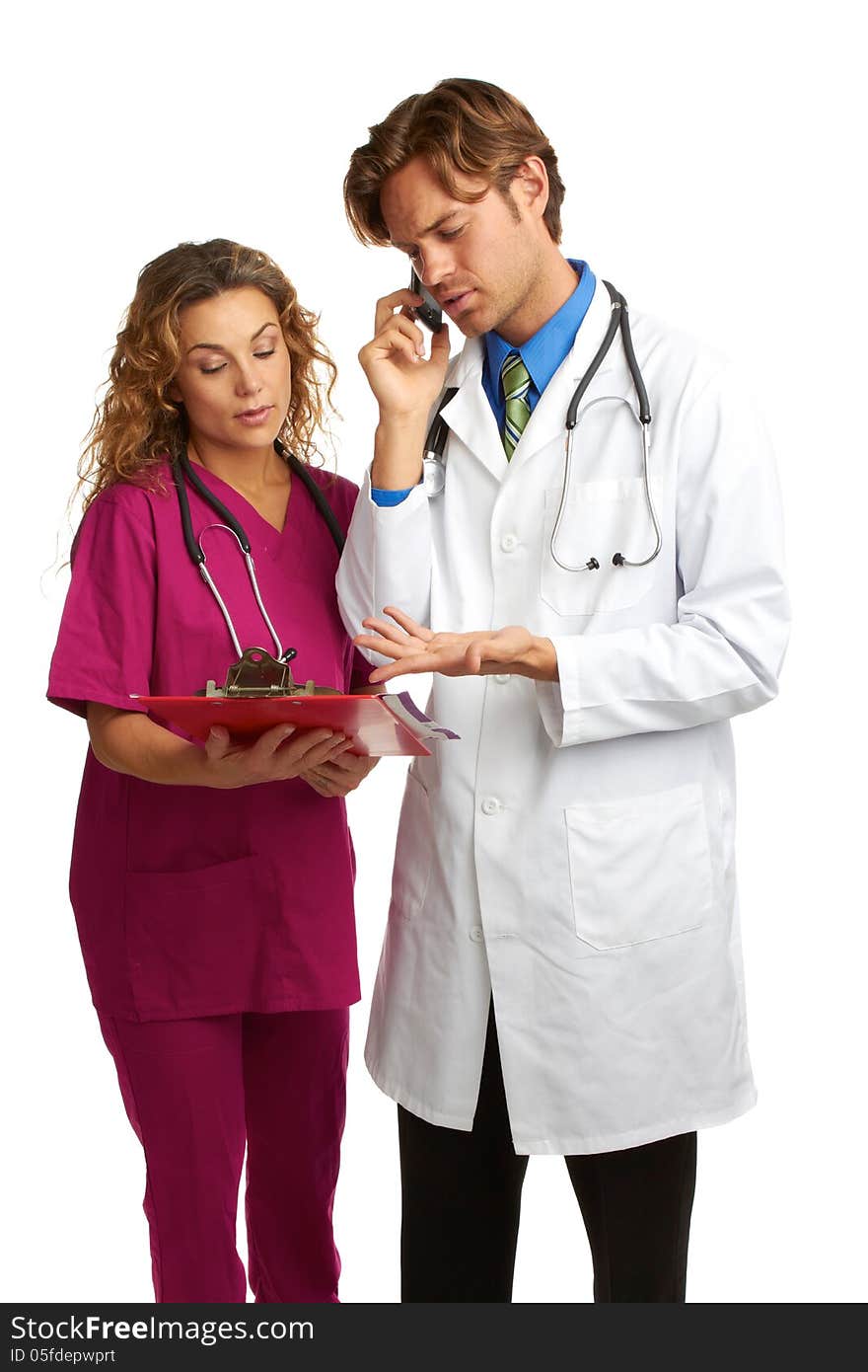 Nurse and doctor looking at chart with bad news isolated on white