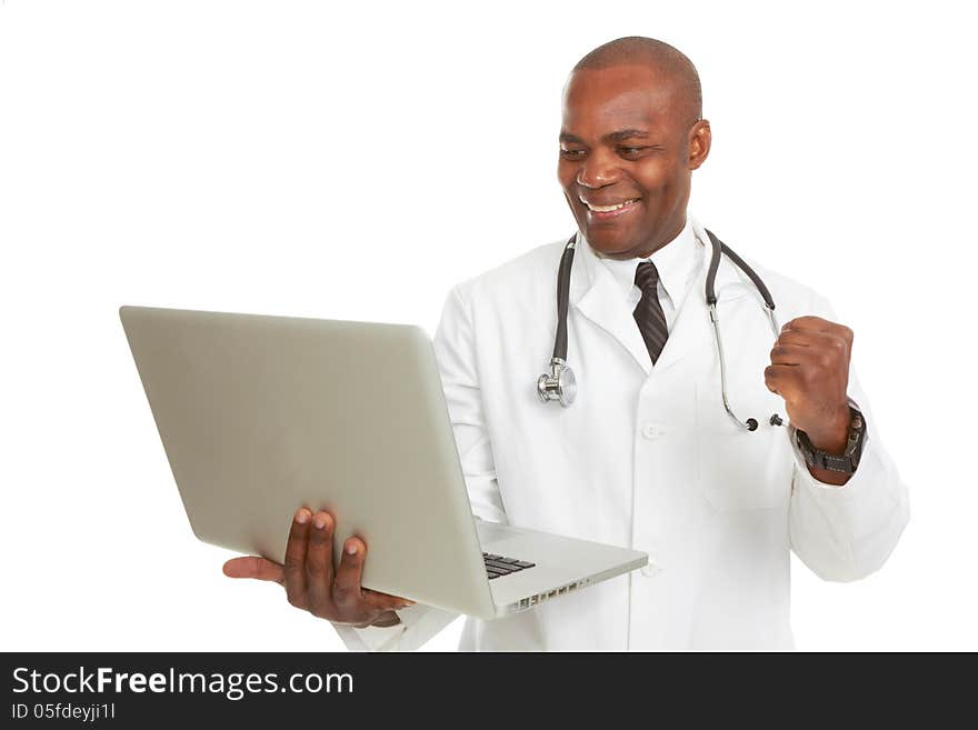 Portrait of African-American doctor holding laptop excited in front of white background, studio shot. Portrait of African-American doctor holding laptop excited in front of white background, studio shot