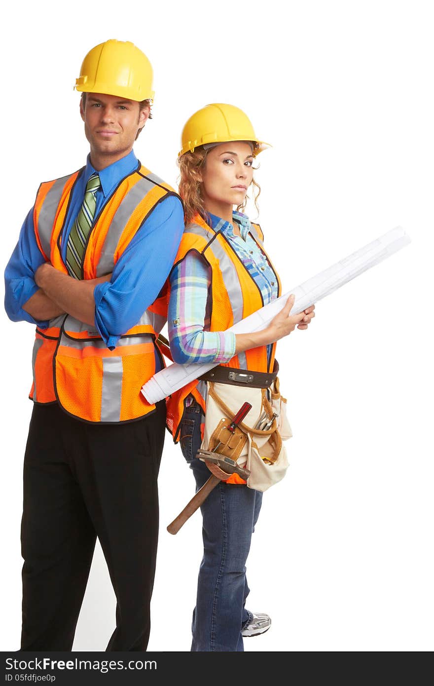 Confident attractive construction workers isolated on white.