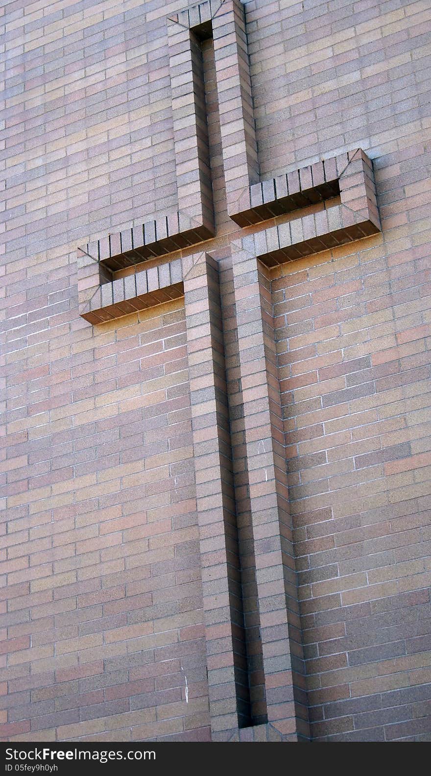 Brick Cross on a outdoor Brick Wall. Brick Cross on a outdoor Brick Wall