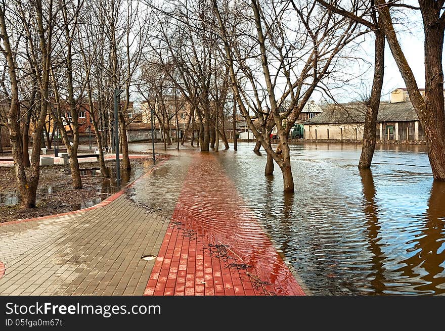 Flooding rivers flooded city park