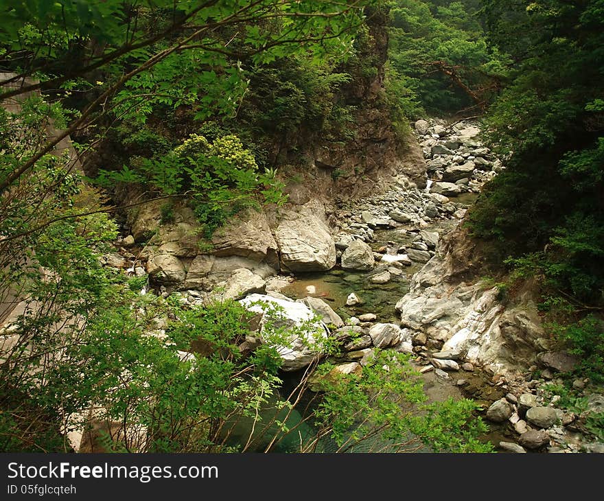 River in Japanese mountains flowing through rocks. River in Japanese mountains flowing through rocks