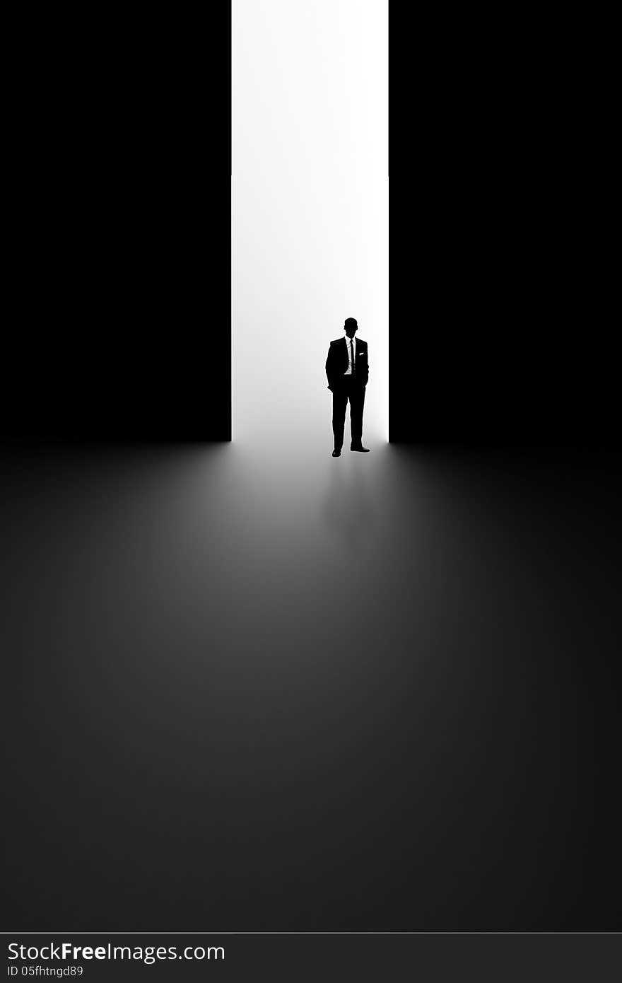 Black and white image of a silhouette of a business man in a suit and tie in a large open doorway. Black and white image of a silhouette of a business man in a suit and tie in a large open doorway.