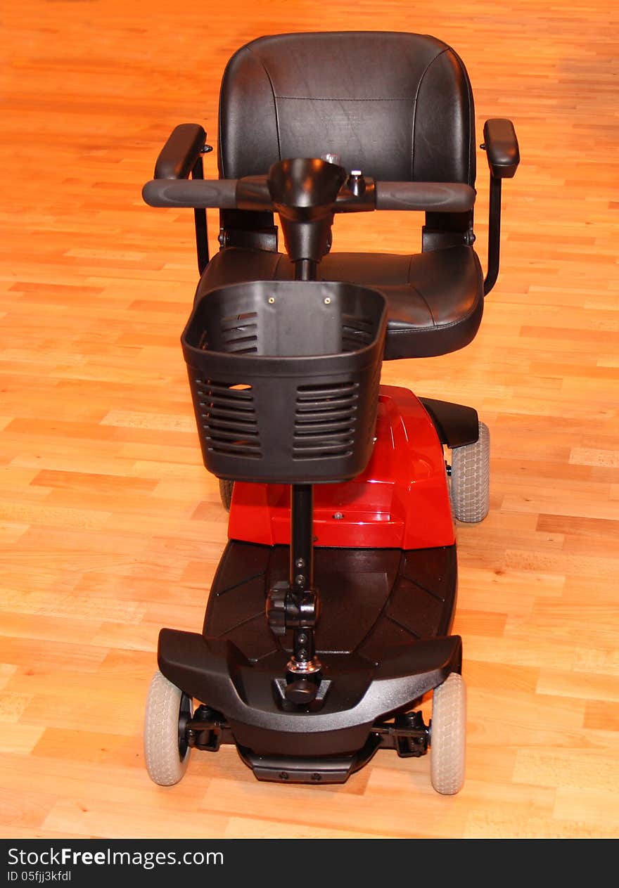 A Modern Four Wheeled Motorised Electric Scooter.