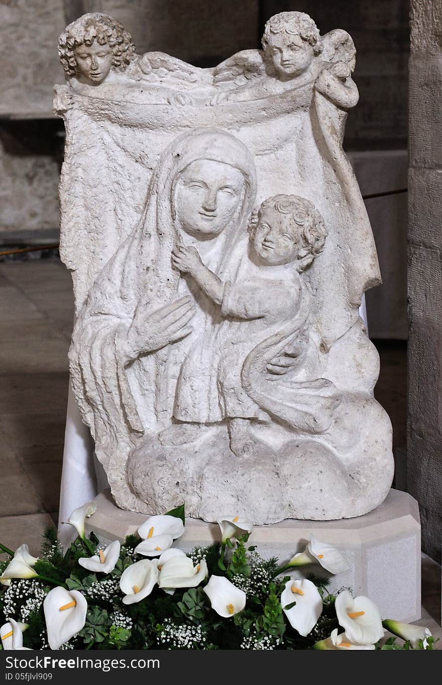 Cathedral of Molfetta, Apulia - ITALY: bas-relief stone madonna with child