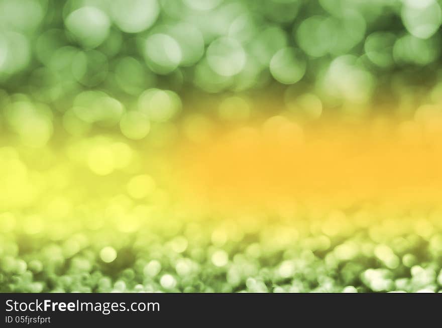 Abstract circular green bokeh background.