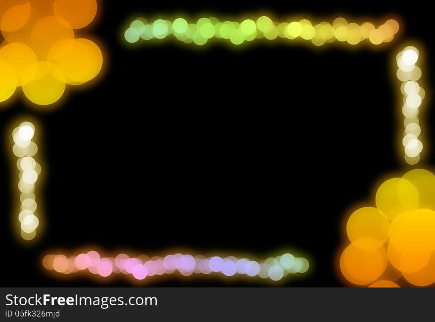 Abstract glowing bokeh light frame on black background. Abstract glowing bokeh light frame on black background