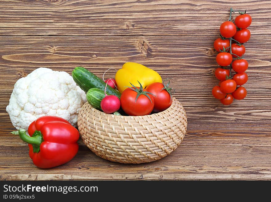 Vegetable still life on a dark wooden background