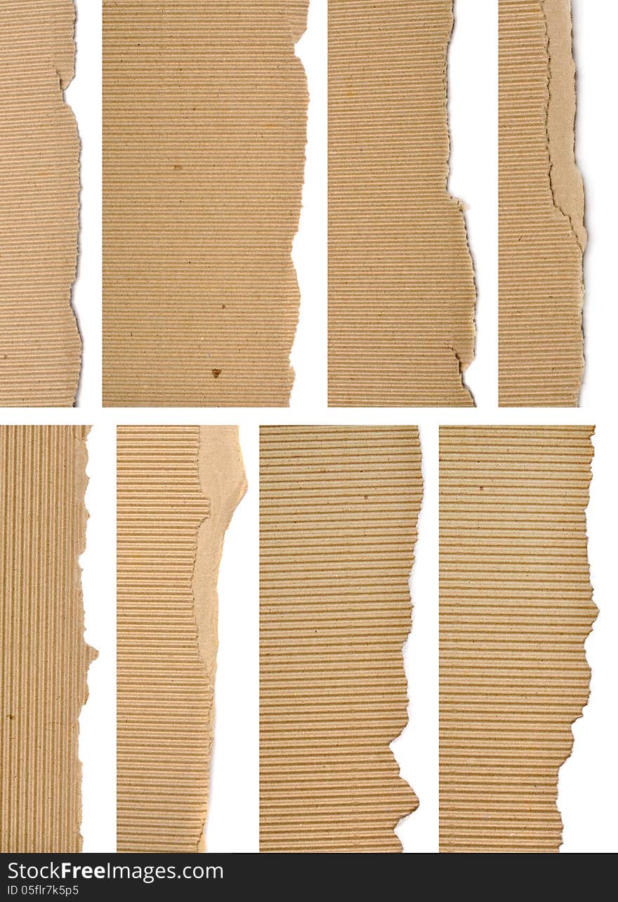 Set of textured cardboard with torn edges isolated over white