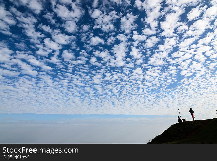 White Fluffy Clouds In The Blue Sky