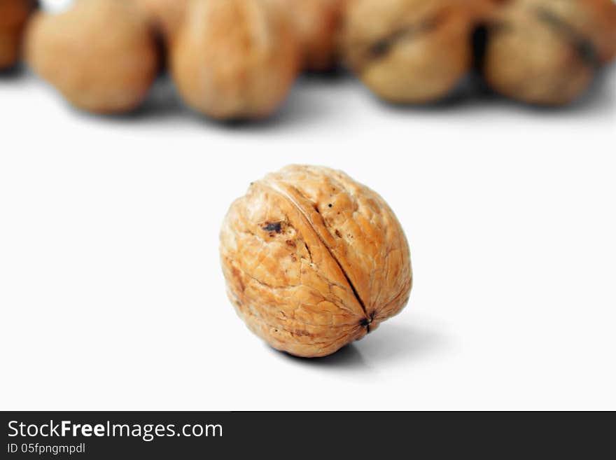 Walnuts on a white background