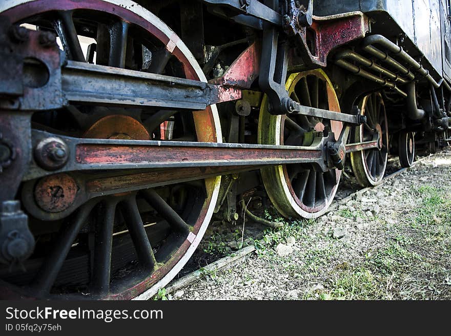 Old steam locomotive wheels exhibiting at Da Lat City, Vietnam