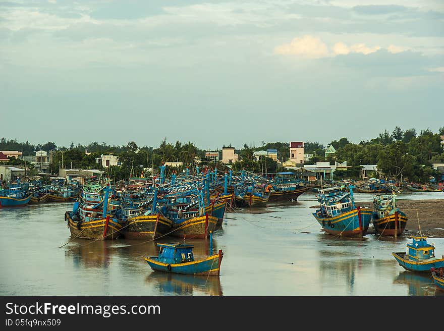 Fishing boats docked in harbor