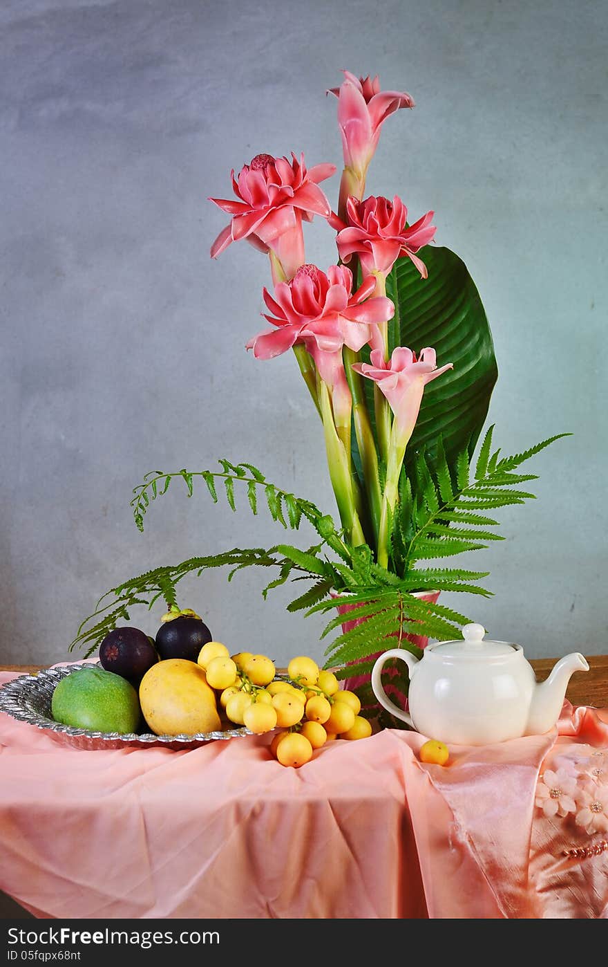 Tropical fruit and flower composition