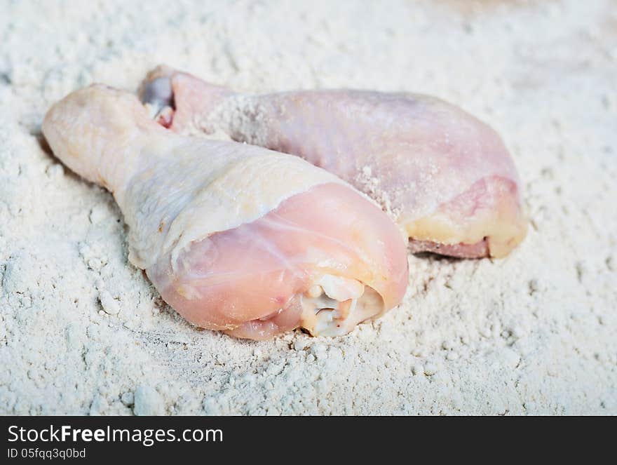 Chicken raw meat over flour