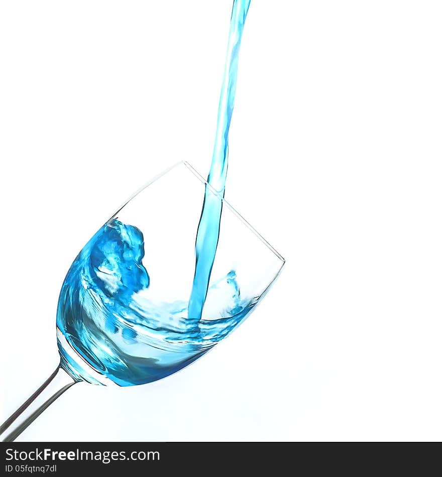 Blue gin poured into glass