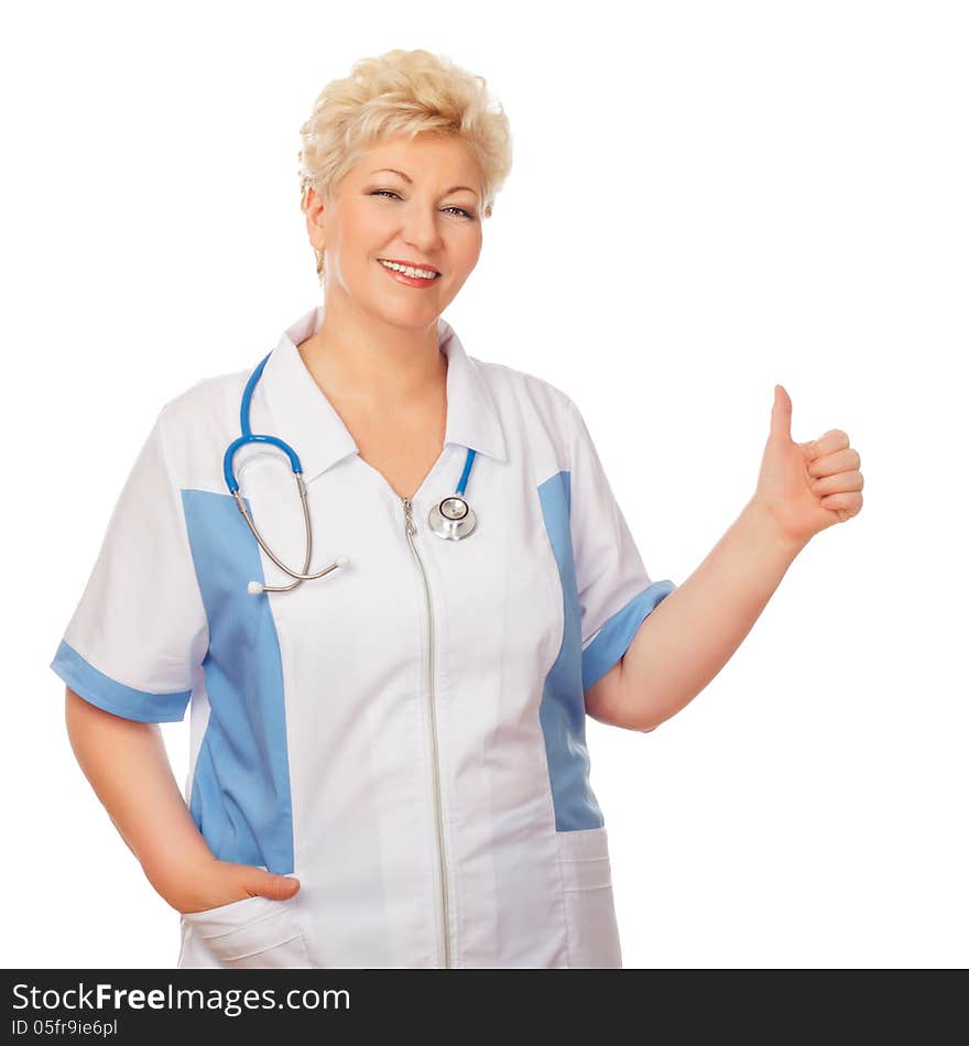 Smiling medical doctor woman shows thumb. Isolated on white background.