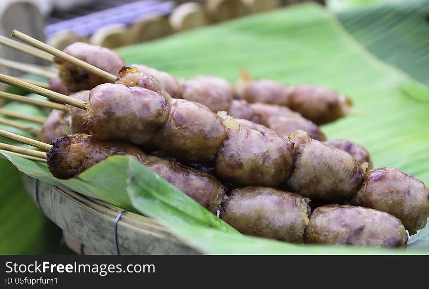 Sausage on a banana leaf in a restaurant