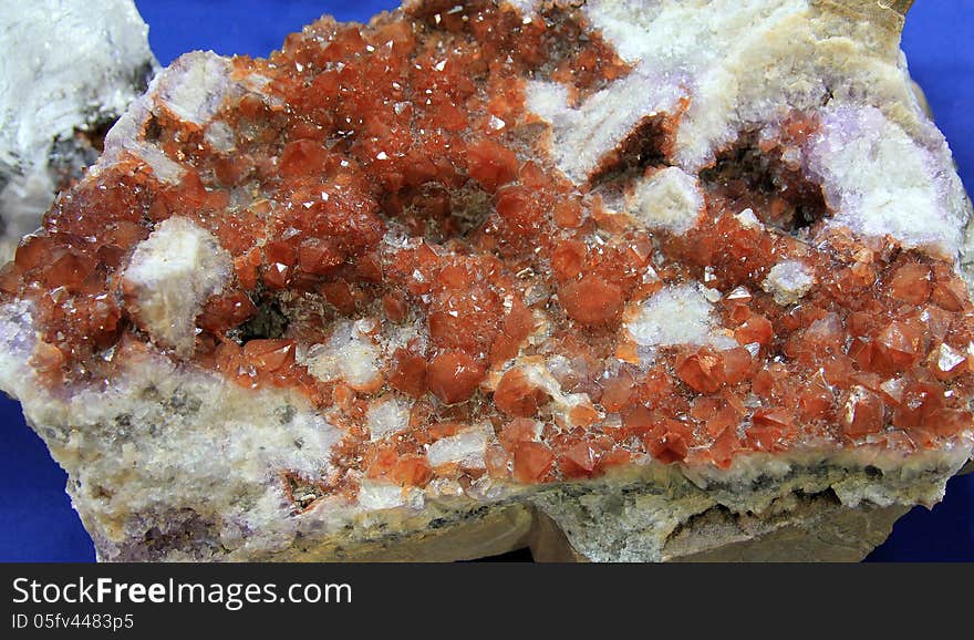 Many amethyst crystals on the rock