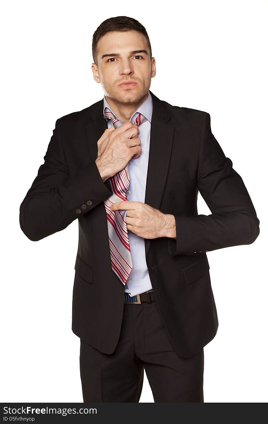 Businessman tied his tie