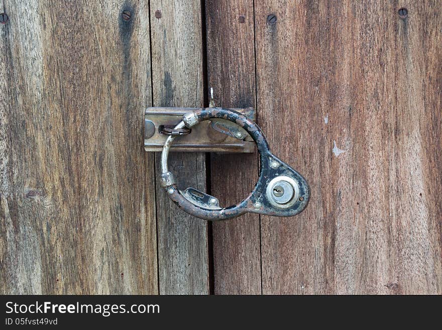 The old wooden doors and lock.